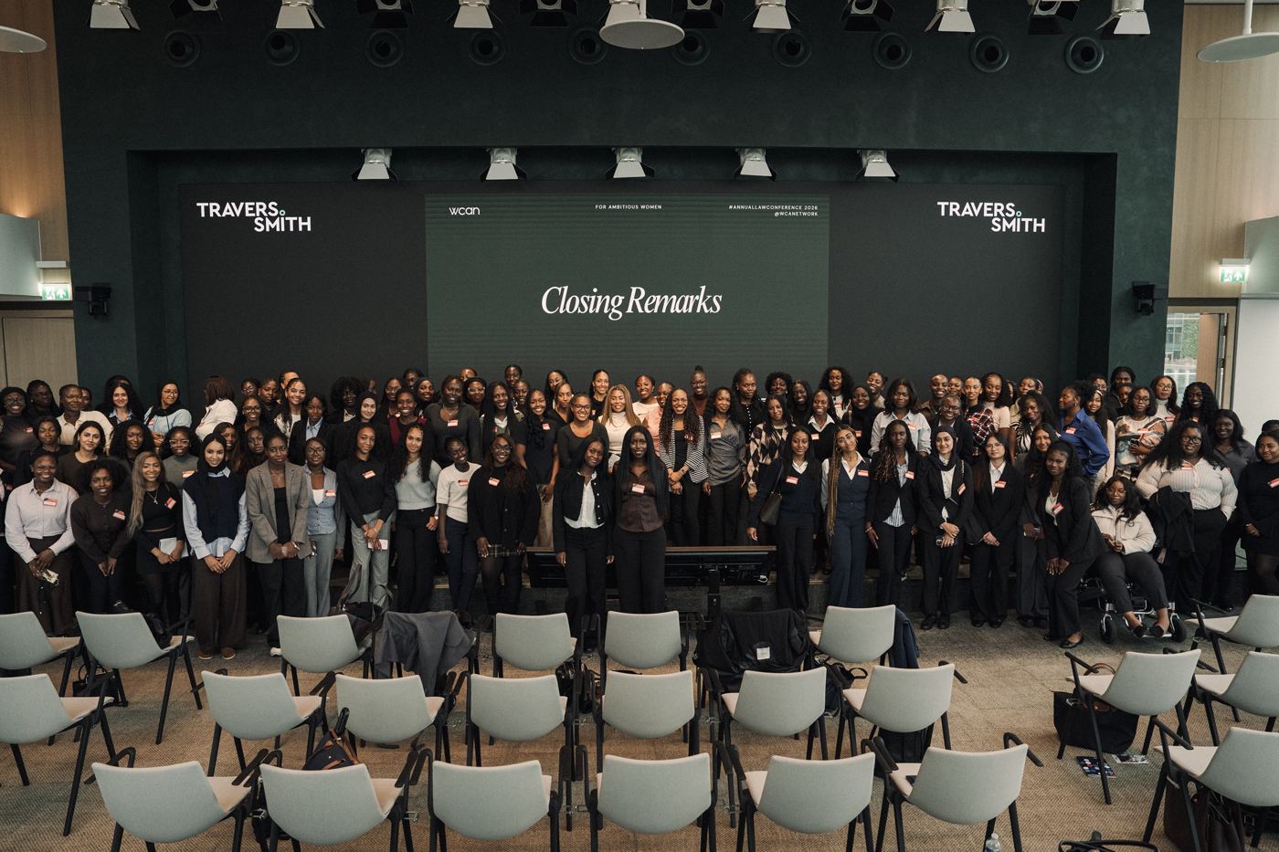 Women gathered on stage for closing remarks at WCAN's Annual Law Conference at Travers Smith